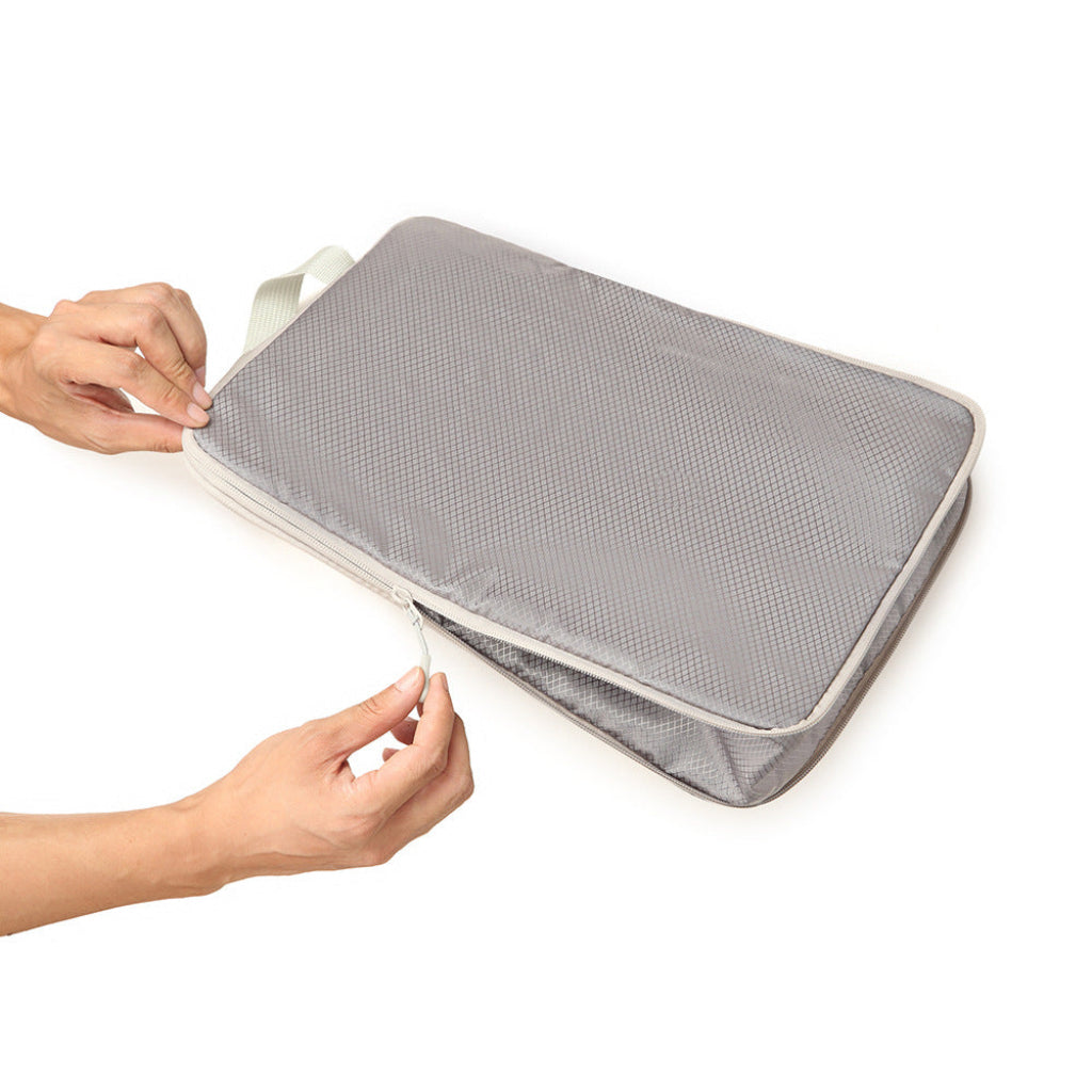 Sac de rangement voyage HomyBag gris – format moyen pochette zippée